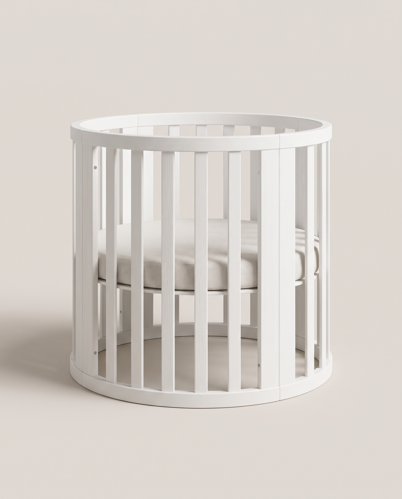 Primrose Round Nursery Crib - front three-quarter hero shot