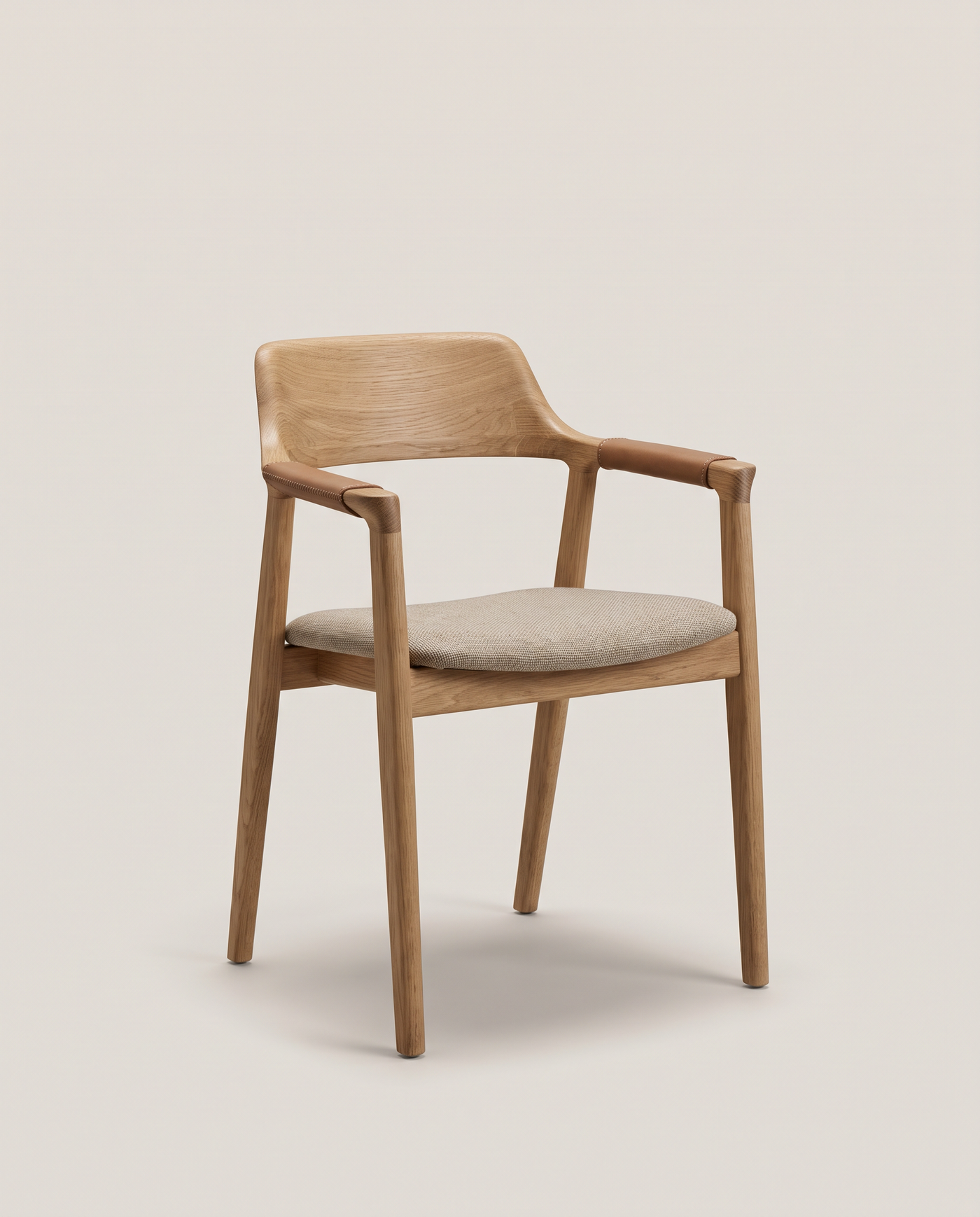 Oakhurst Carver Dining Chair - front three-quarter hero shot