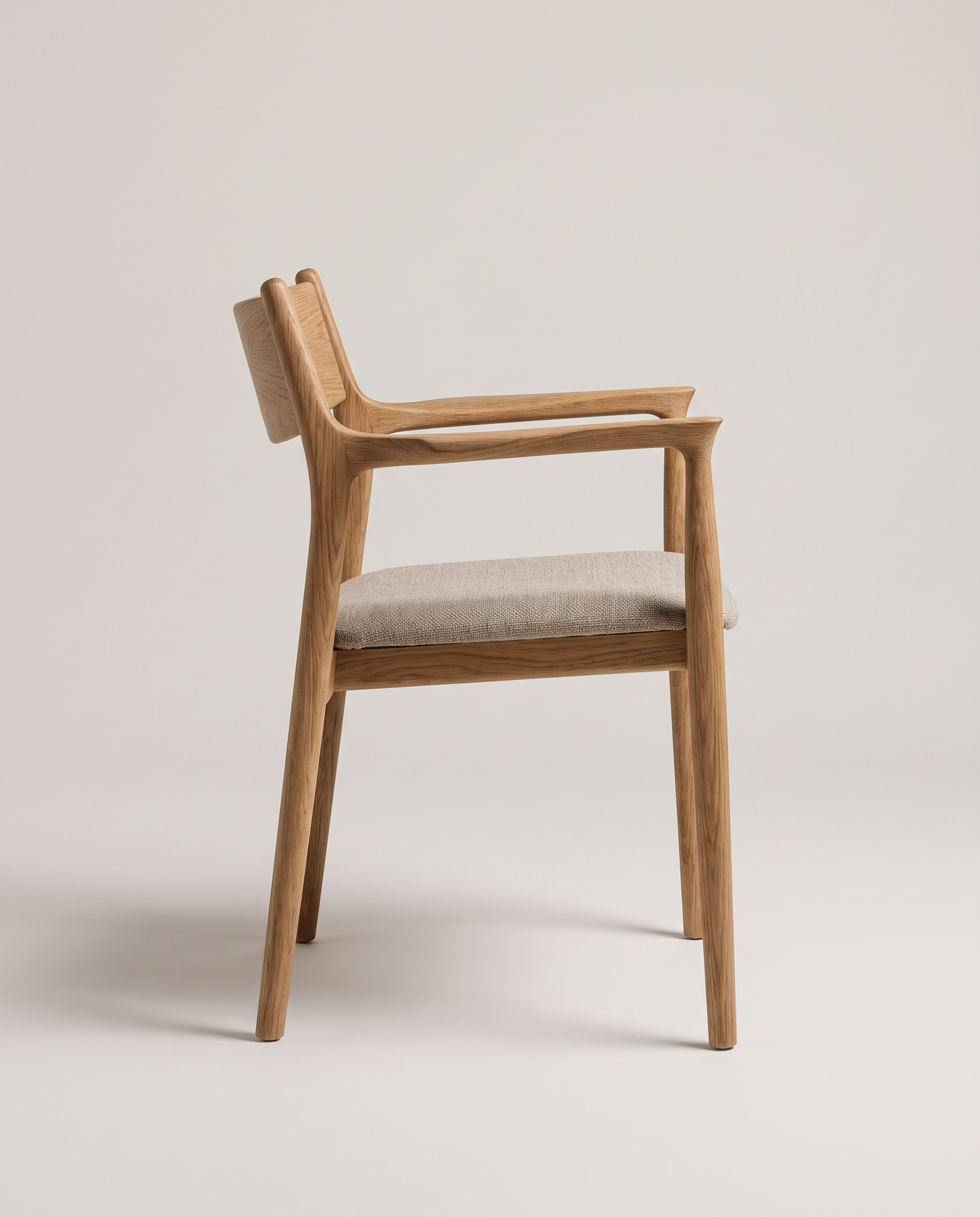 Oakhurst Carver Dining Chair - side profile detail shot
