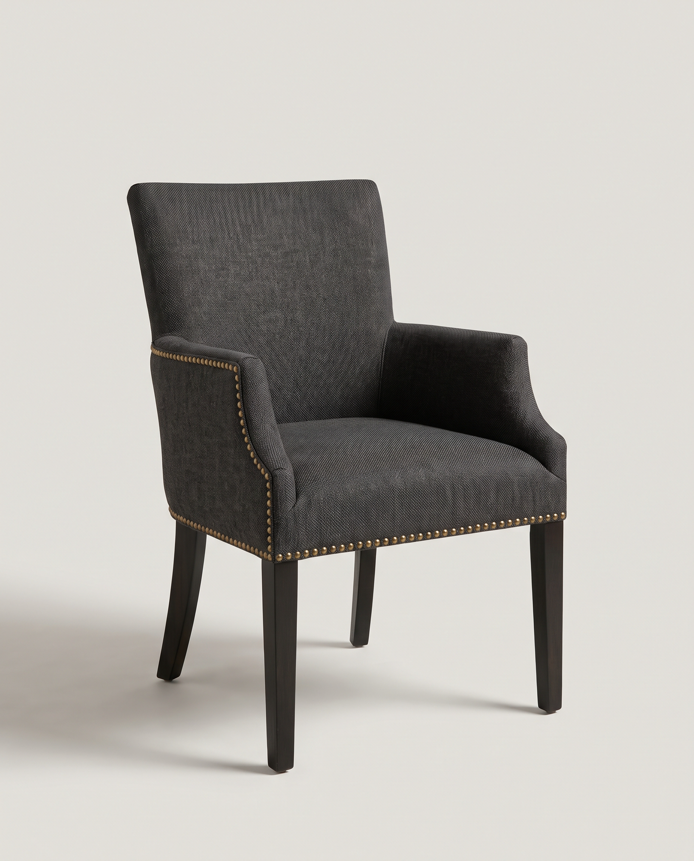 Fairmont Studded Carver Chair - front three-quarter hero shot